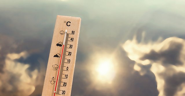 termometer och soligt väder